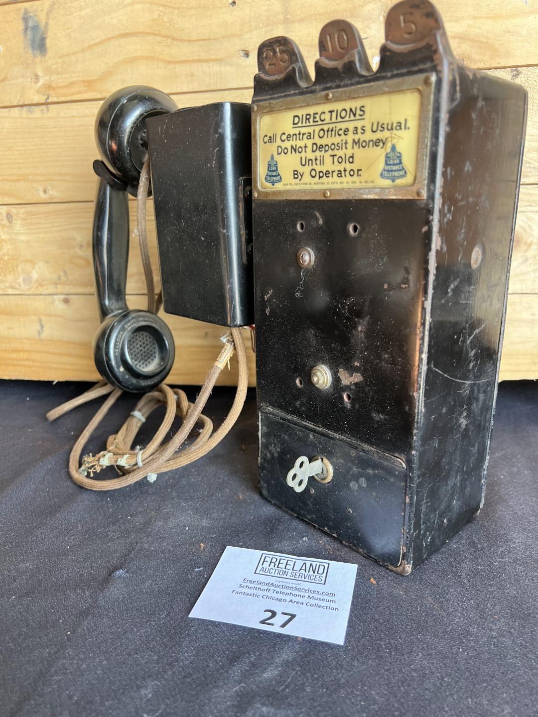 unusual Gray Paystation coin collector attached to a Kellogg Spacesaver telephone