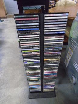 Large Collection of Rock CDs in Storage Tower