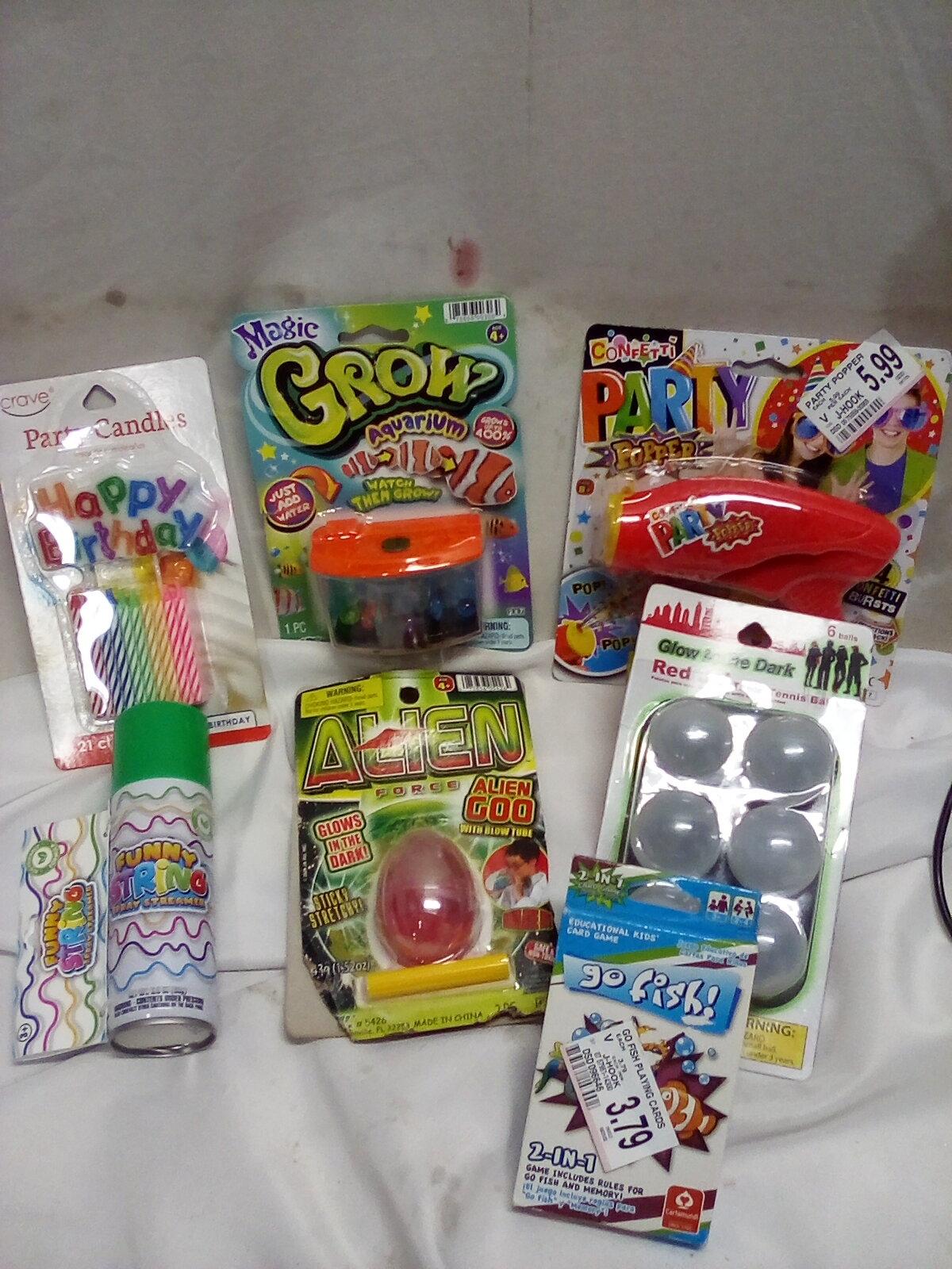 Small lot of childrens toys, 21 count birthday candles