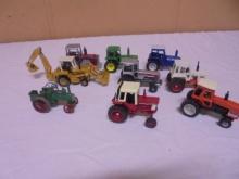 Group of 9 Assorted 1/64th Scale Die Cast Tractors