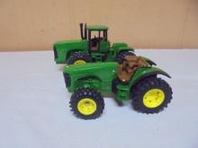 2 John Deere Toy Tractors