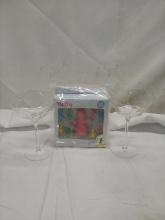 2 wine glasses , bottle stopper with charms