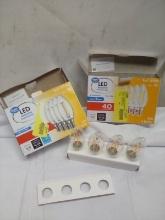2 Packs of 4 Great Value LED Dimmable Clear Glass Soft White B10 Bulbs
