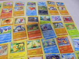 Large Group of Pokemon Cards