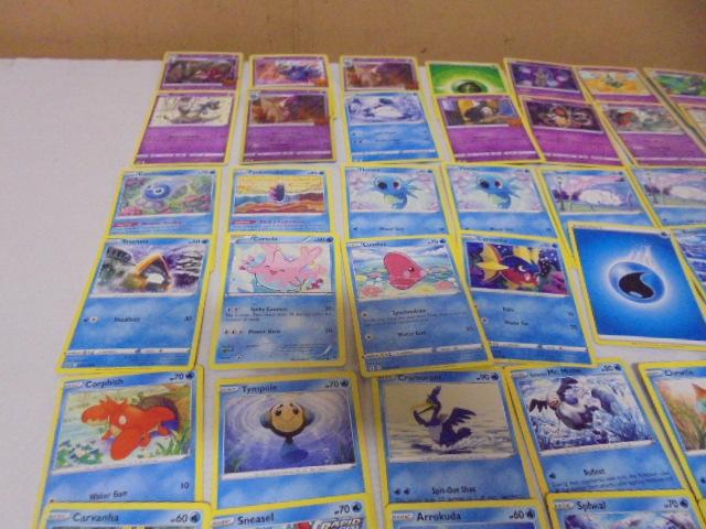 Large Group of Pokemon Cards