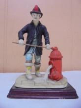 Firefighter Opening Hydrant Statue