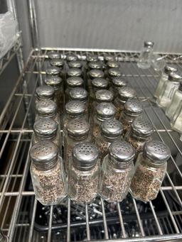 LOT of Salt and Pepper Shakers on this shelf