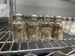 LOT of Salt and Pepper Shakers on this shelf