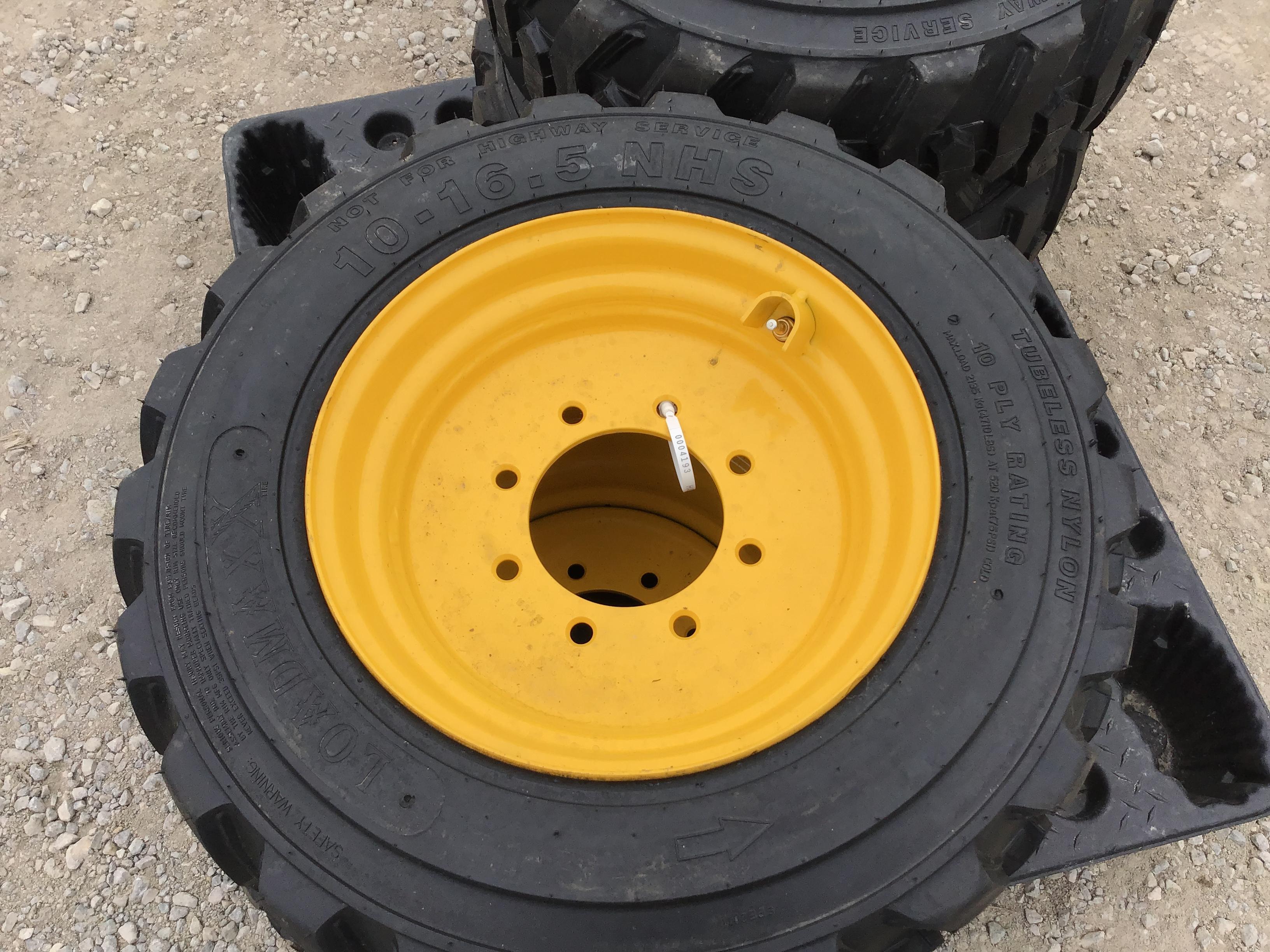 (4) 10-16.5 LOADMAXX SKID STEER TIRES ON NH/JD/CAT WHEELS - ALL ONE PRICE