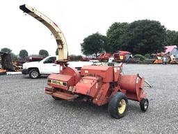 1060 GEHL CHOPPER W/ HAY AND CORN HEAD INCLUDED