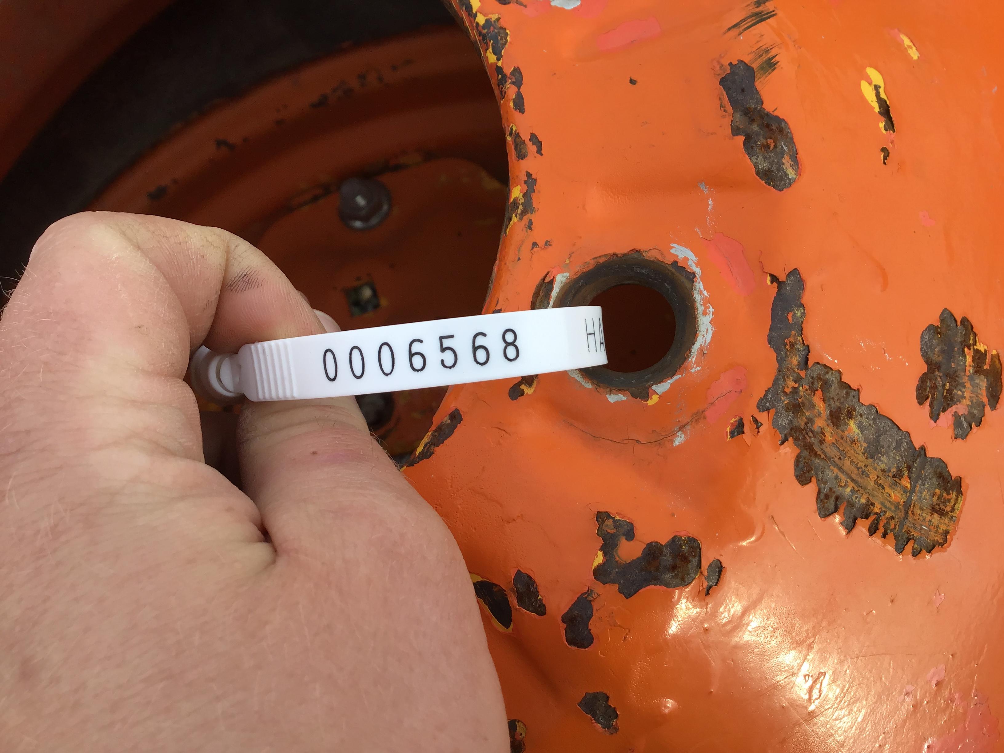 (2) 9.5-24 TRACTOR TIRES AND RIMS - BOTH ONE PRICE