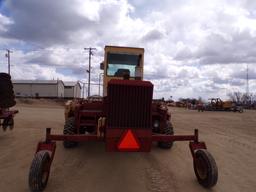 NEW HOLLAND 1499 SELF PROPELLED WINDROWER