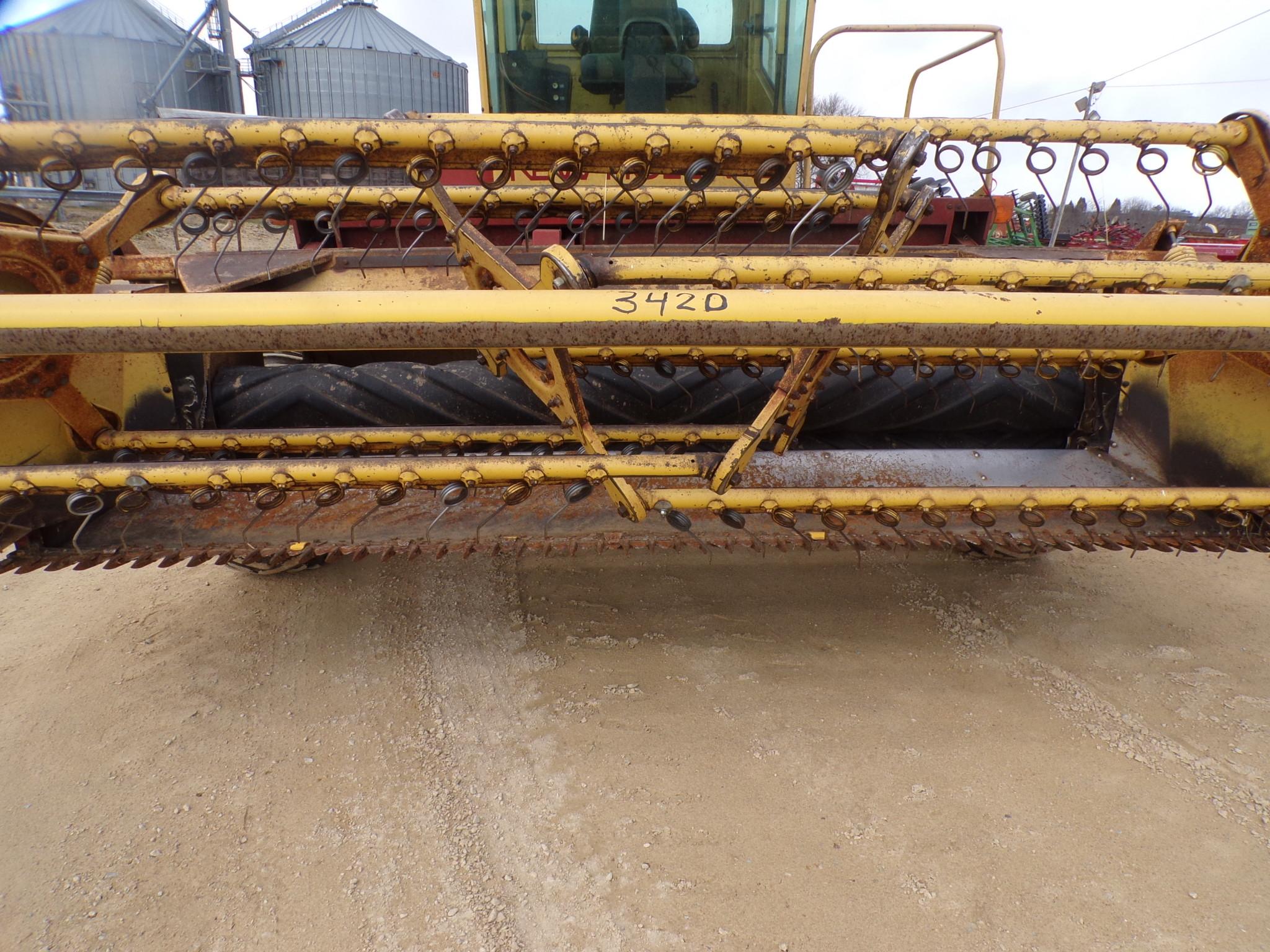 NEW HOLLAND 1499 SELF PROPELLED WINDROWER