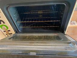 USED 30 INCH OVEN WITH STOVE TOP- TOLD IN WORKING ORDER