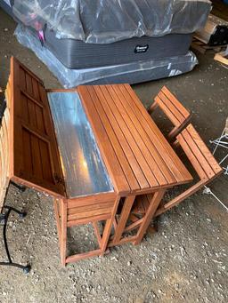 PATIO SET WITH TWO CHAIRS AND HAS FOLDING TOP
