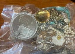 SMALL BAG OF JEWELRY