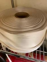 1 ROLL OF WHAT LOOKS LIKE SOME KIND OF PACKING STRAPPING