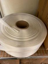 1 ROLL OF WHAT LOOKS LIKE SOME KIND OF PACKING STRAPPING