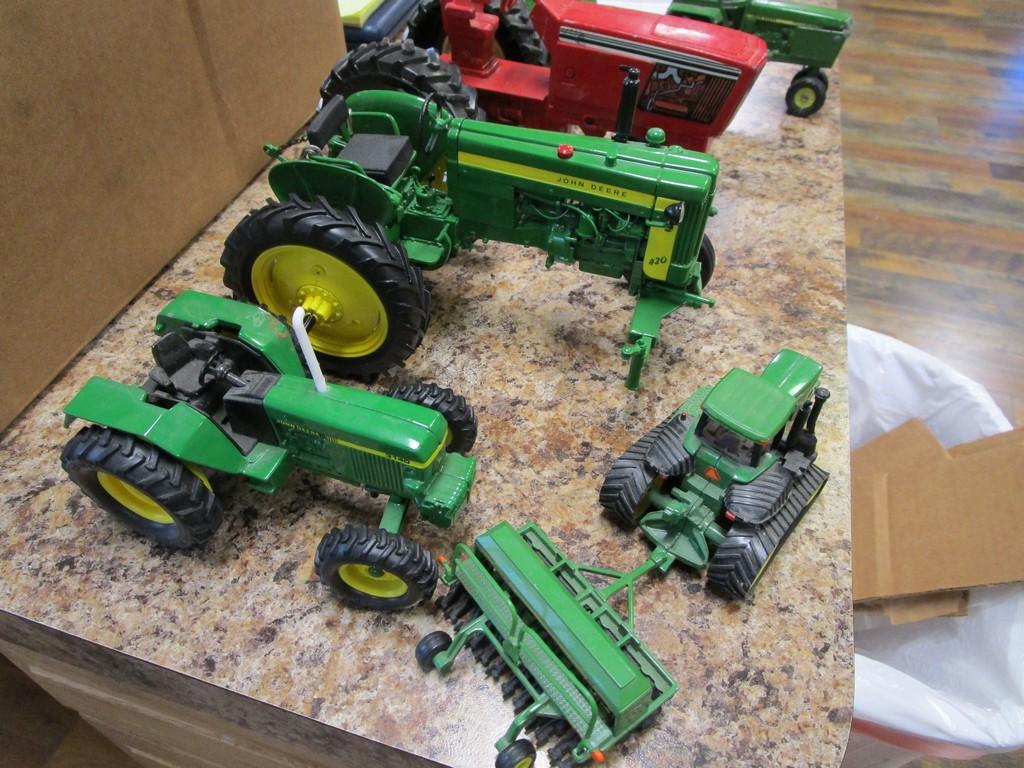 BOX OF MISC TOY TRACTORS