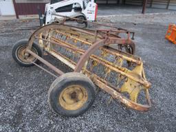 NEW HOLLAND 256 HITCH RAKE