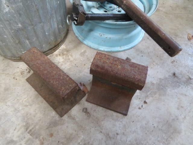 Galvanized trash cans, roller stand