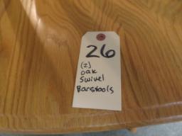 (2) Oak swivel barstools