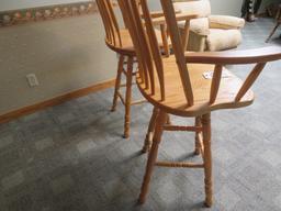 (2) Oak swivel barstools