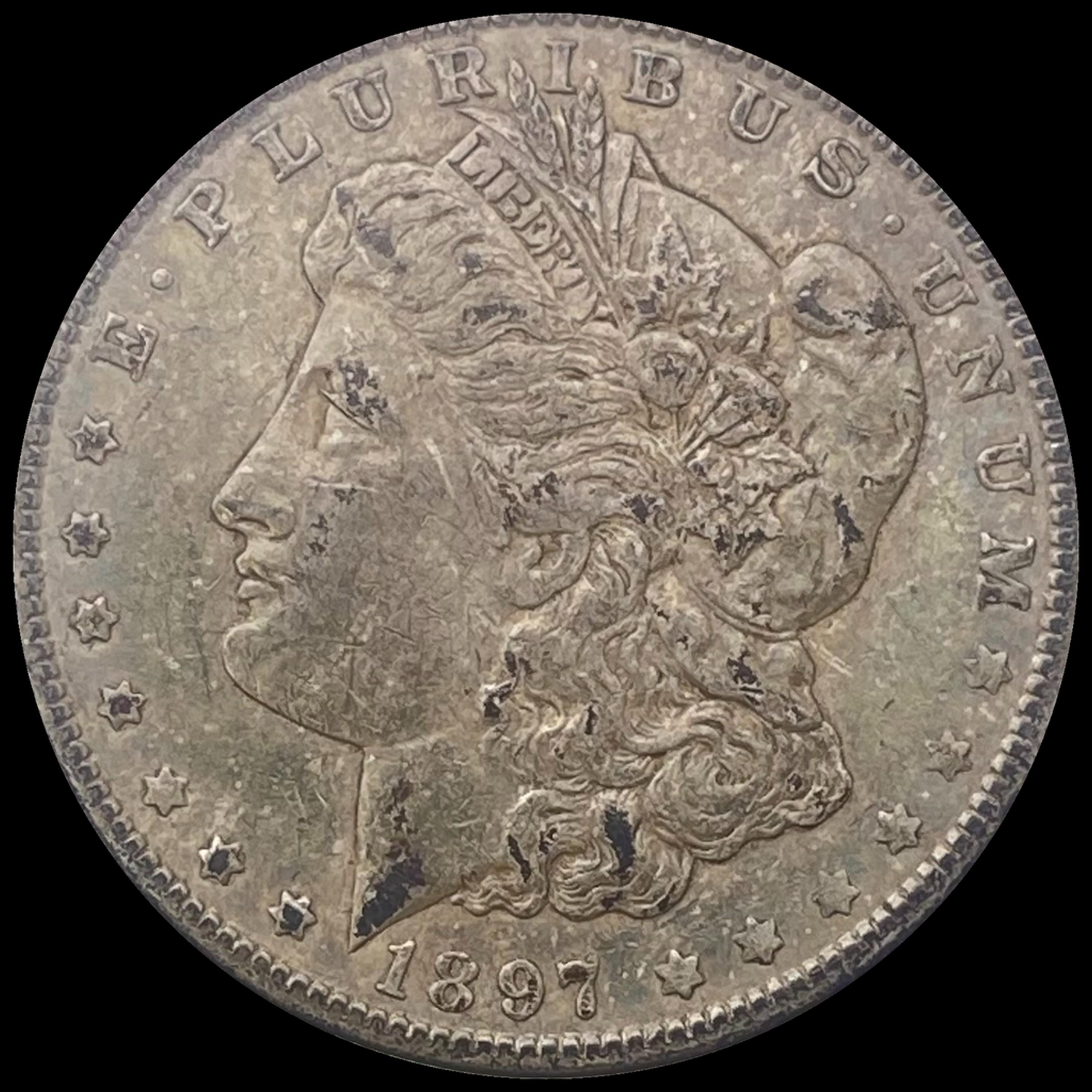 1897-O Morgan Silver Dollar ABOUT UNC