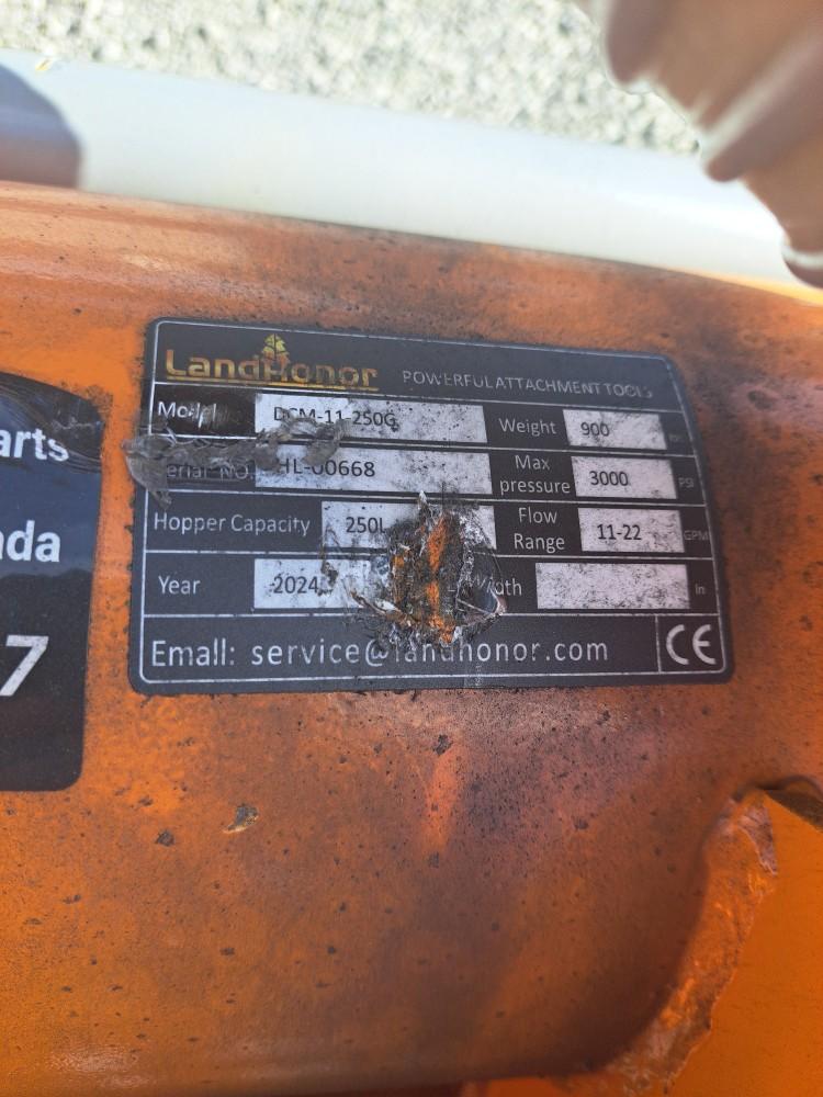 Skid steer double discharge concrete mixer