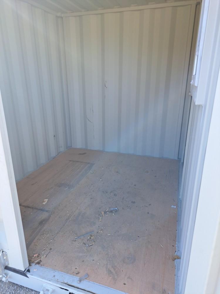 8' Storage Container w/ Man Door & Window (window is broken)