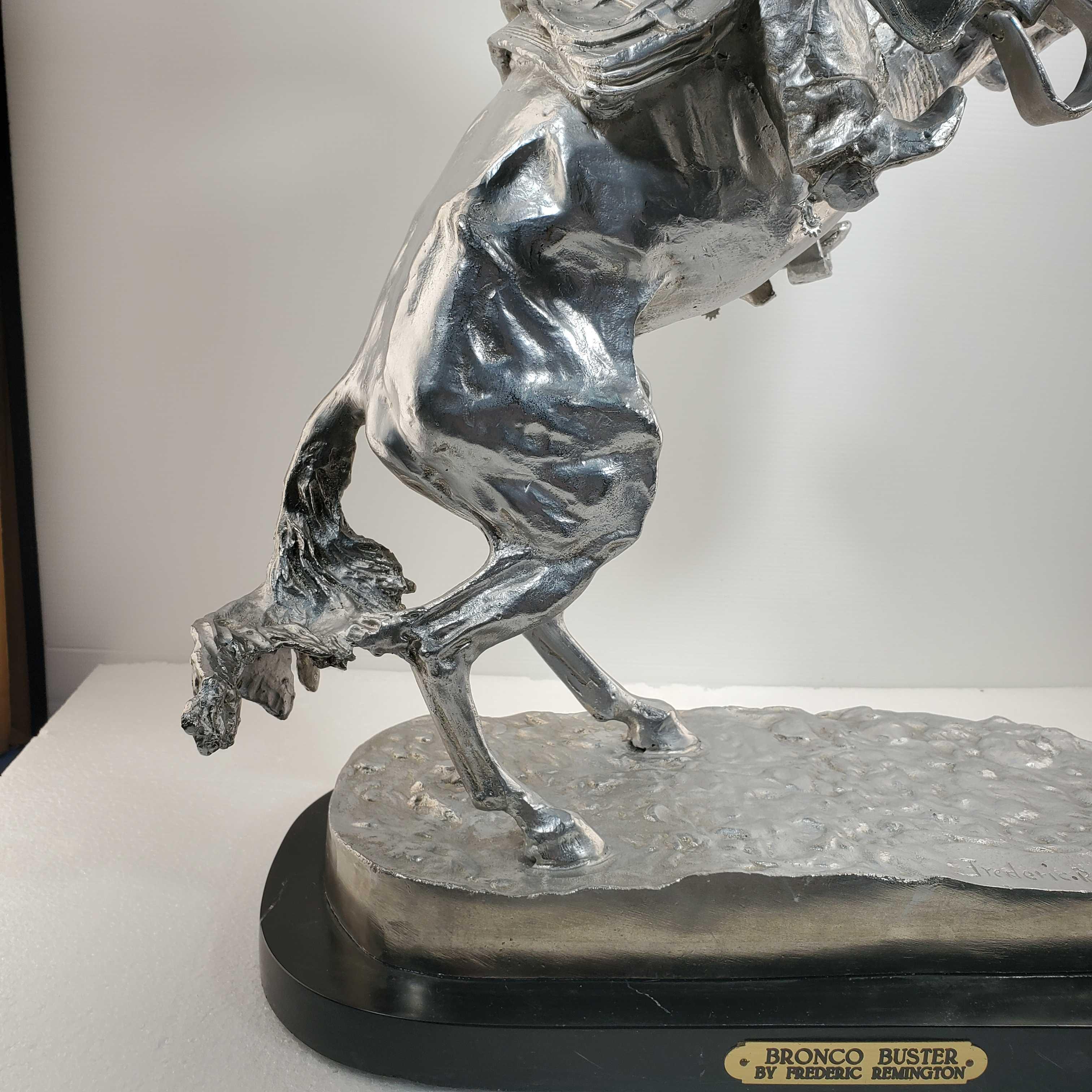 After Frederic Remington " Bronco Buster" Bronze With Silver Patina