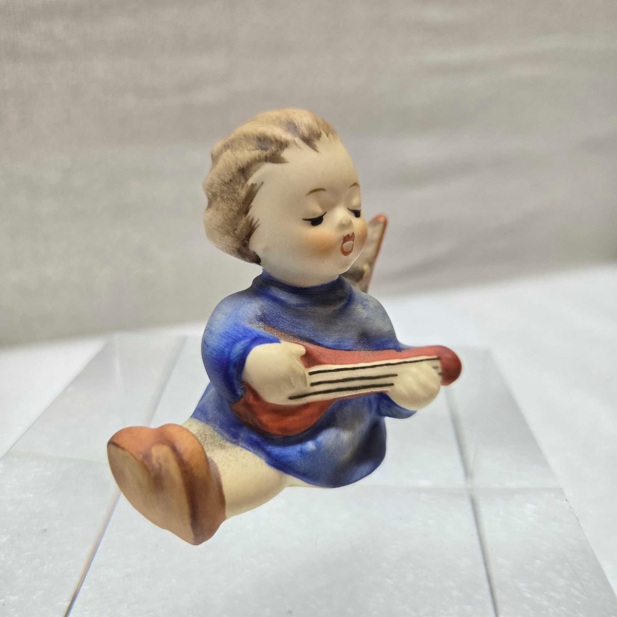 Collection Of 7 Hummel Figurines