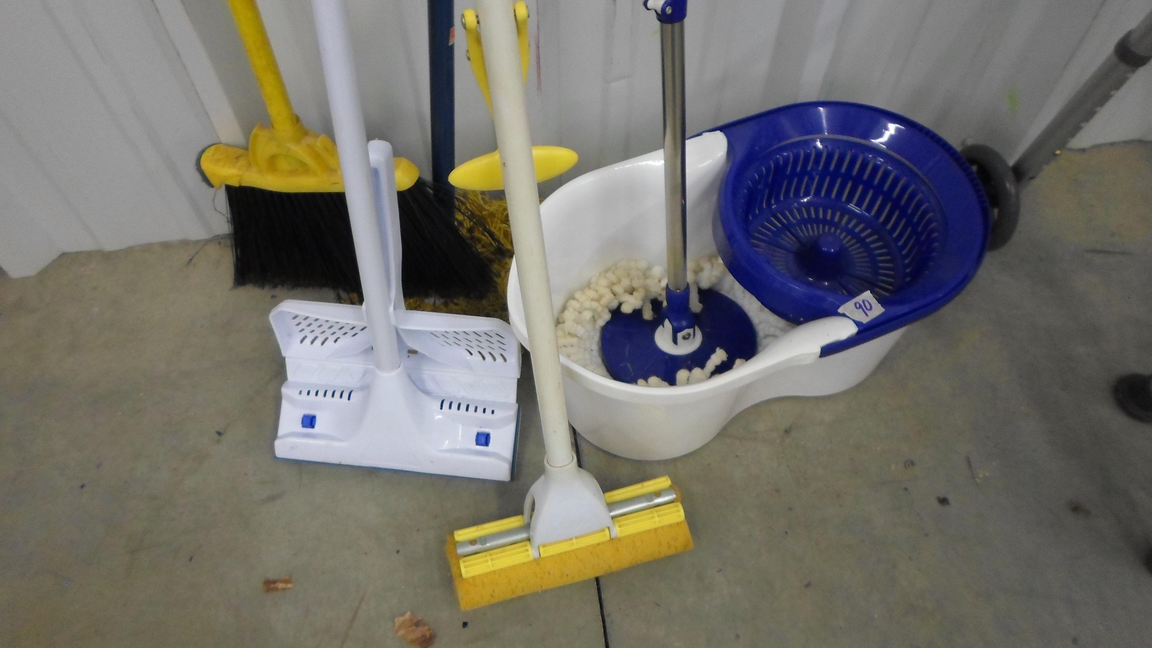 cleaning supplies, mops, duster, broom and a hands free mop bucket