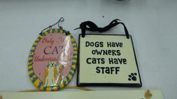 cat decor, various signs with funny sayings on them