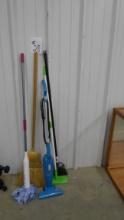cleaning supplies, bissell feather weight vac, swiffer, mop and brooms