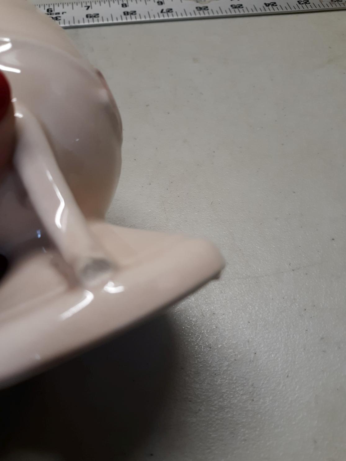 Hull Pink Magnolia Candle Sticks, one has small chip