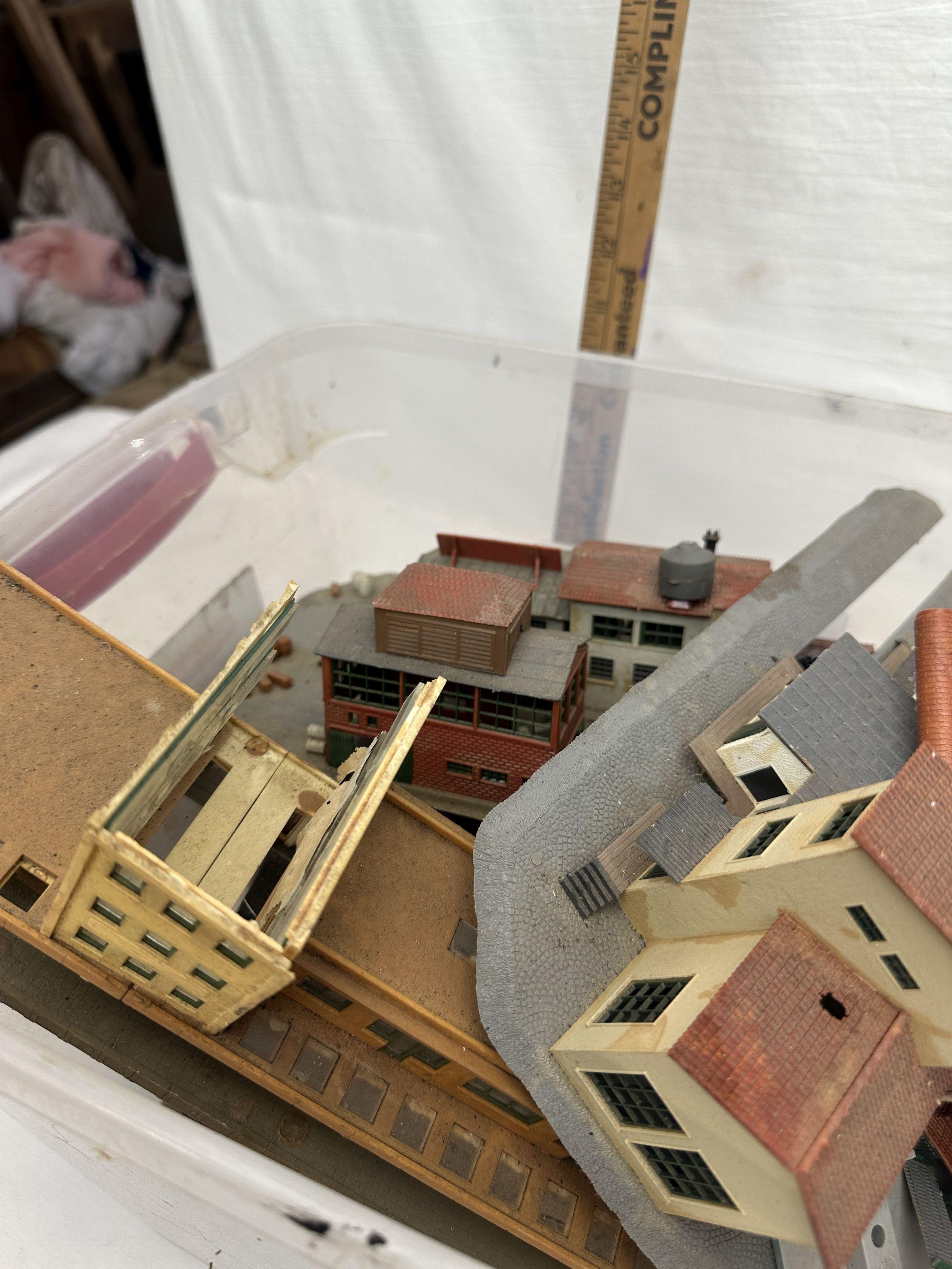 Tote Full of Railroad Track Plastic Buildings