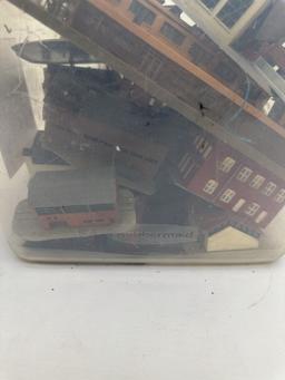 Tote Full of Railroad Track Plastic Buildings