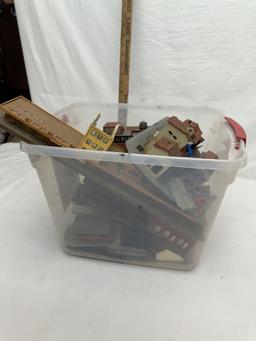 Tote Full of Railroad Track Plastic Buildings