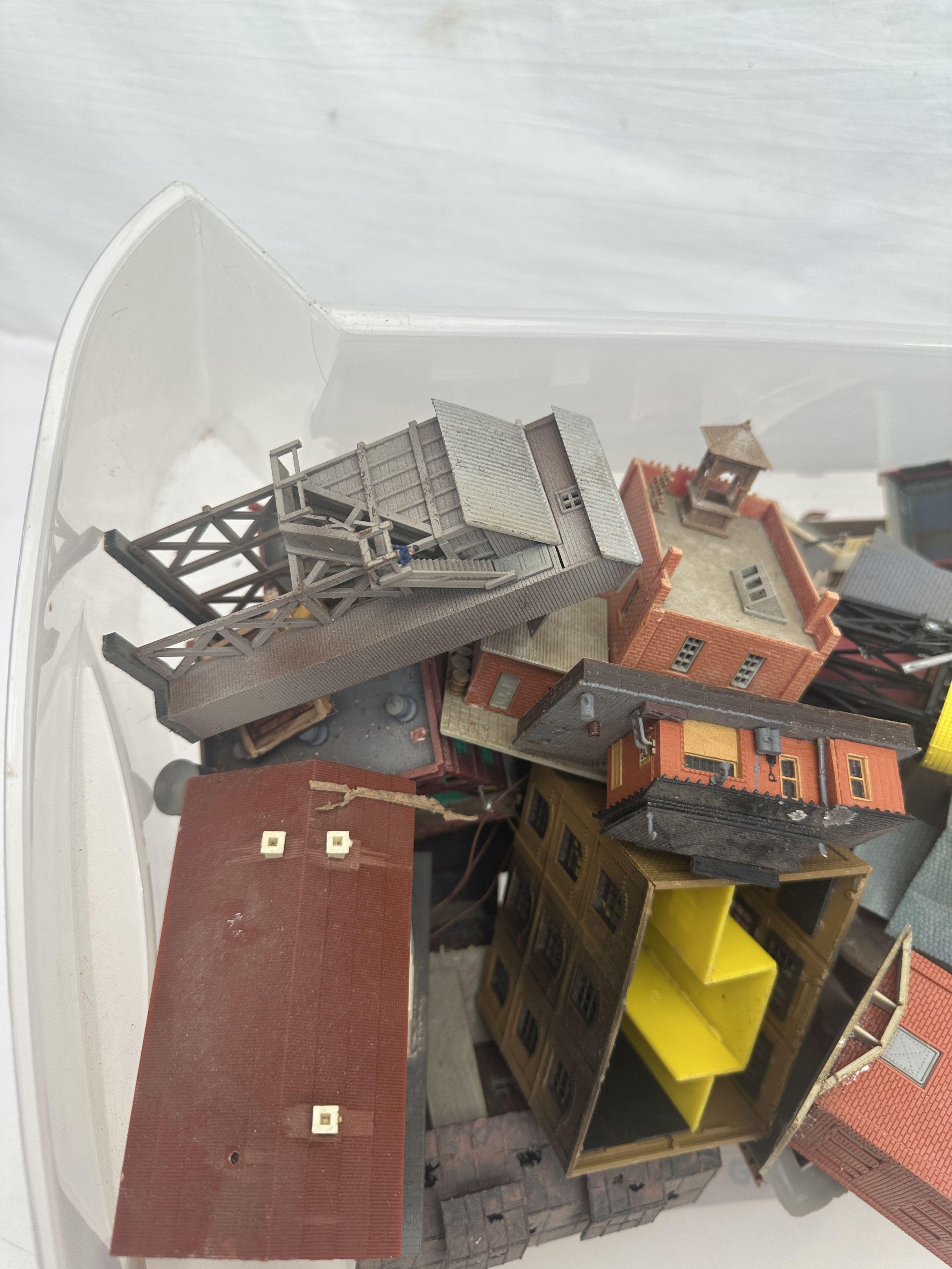 Tote Full of Railroad Track Plastic Buildings