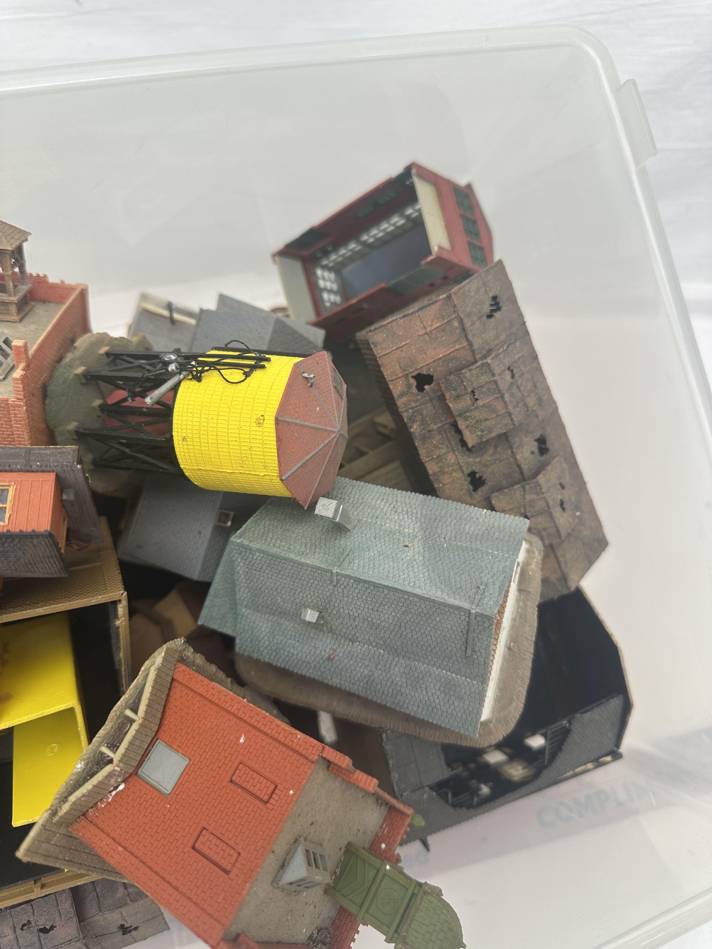 Tote Full of Railroad Track Plastic Buildings