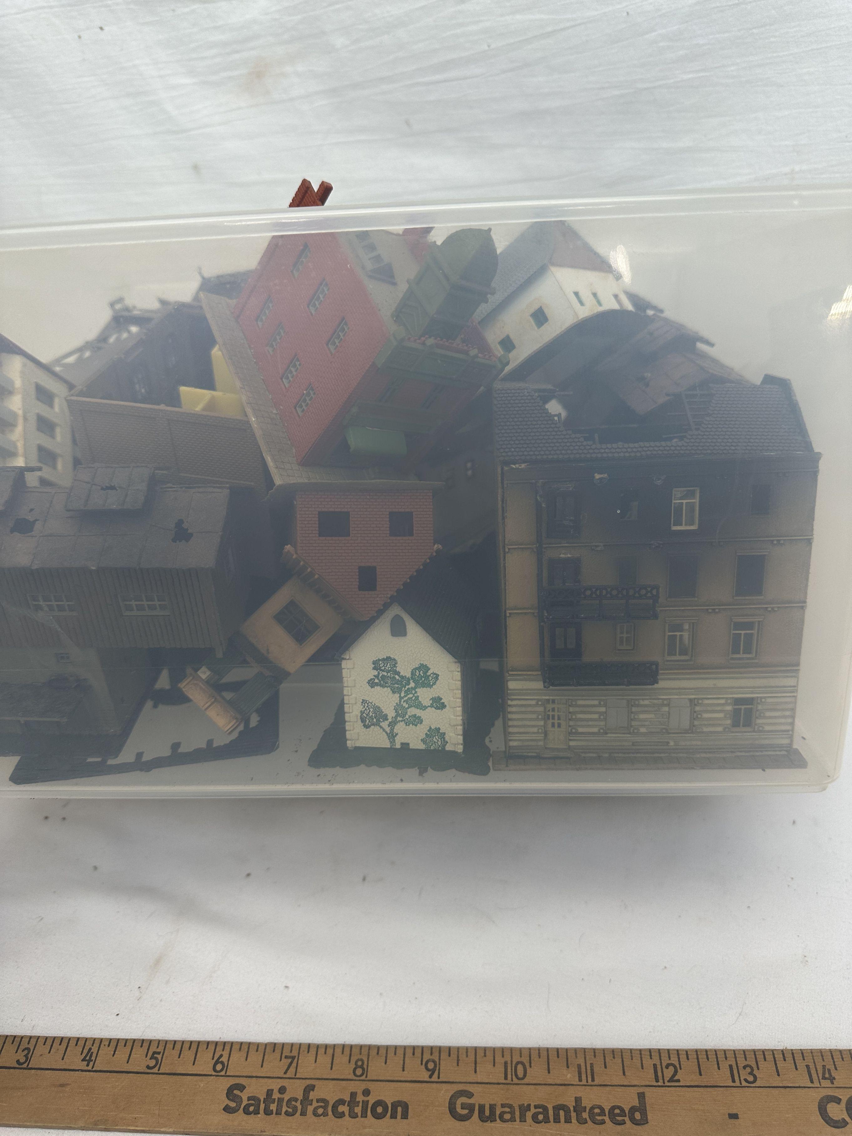 Tote Full of Railroad Track Plastic Buildings