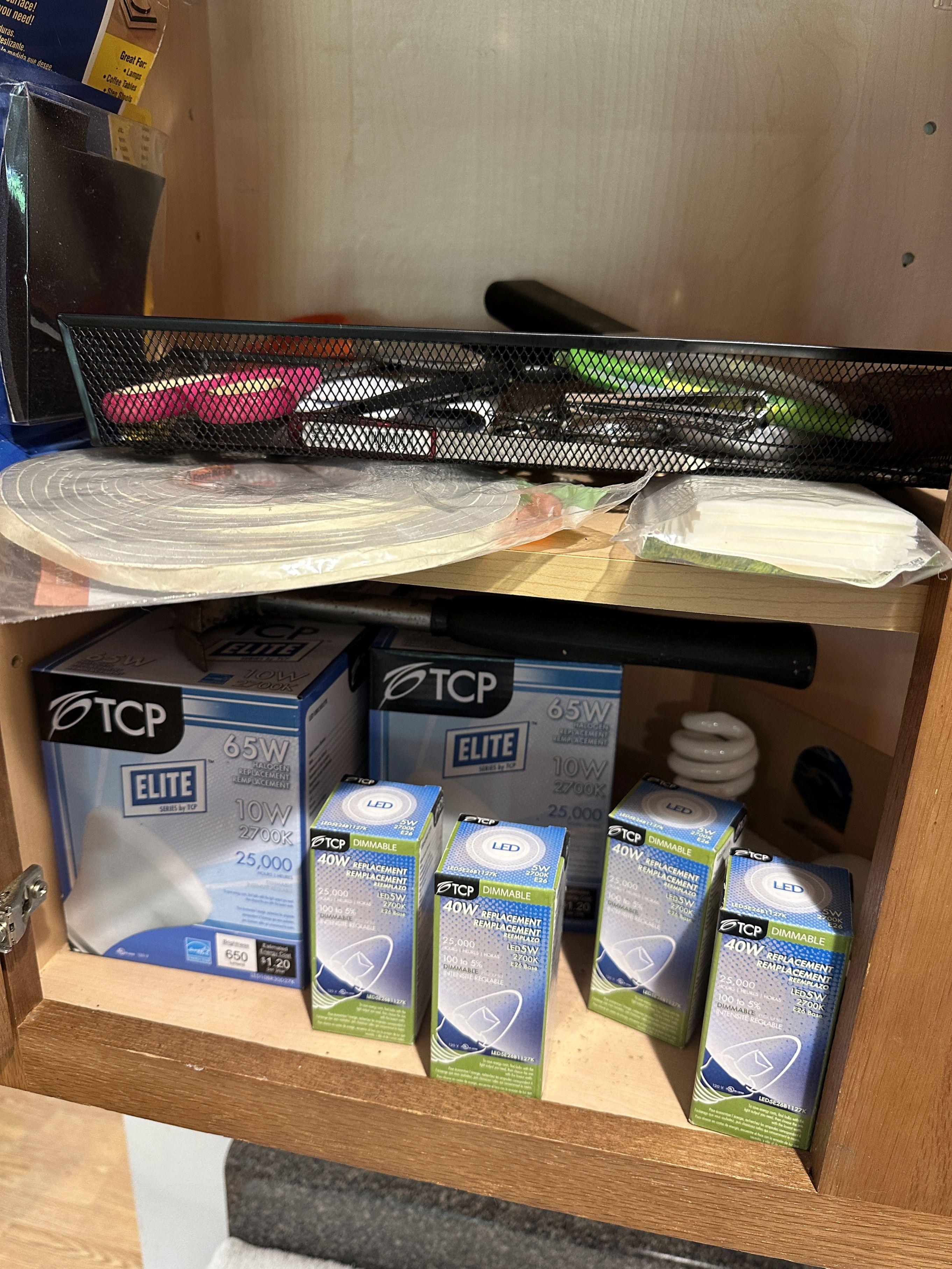 Cabinet Full of Light Bulbs, Hammer, ETC