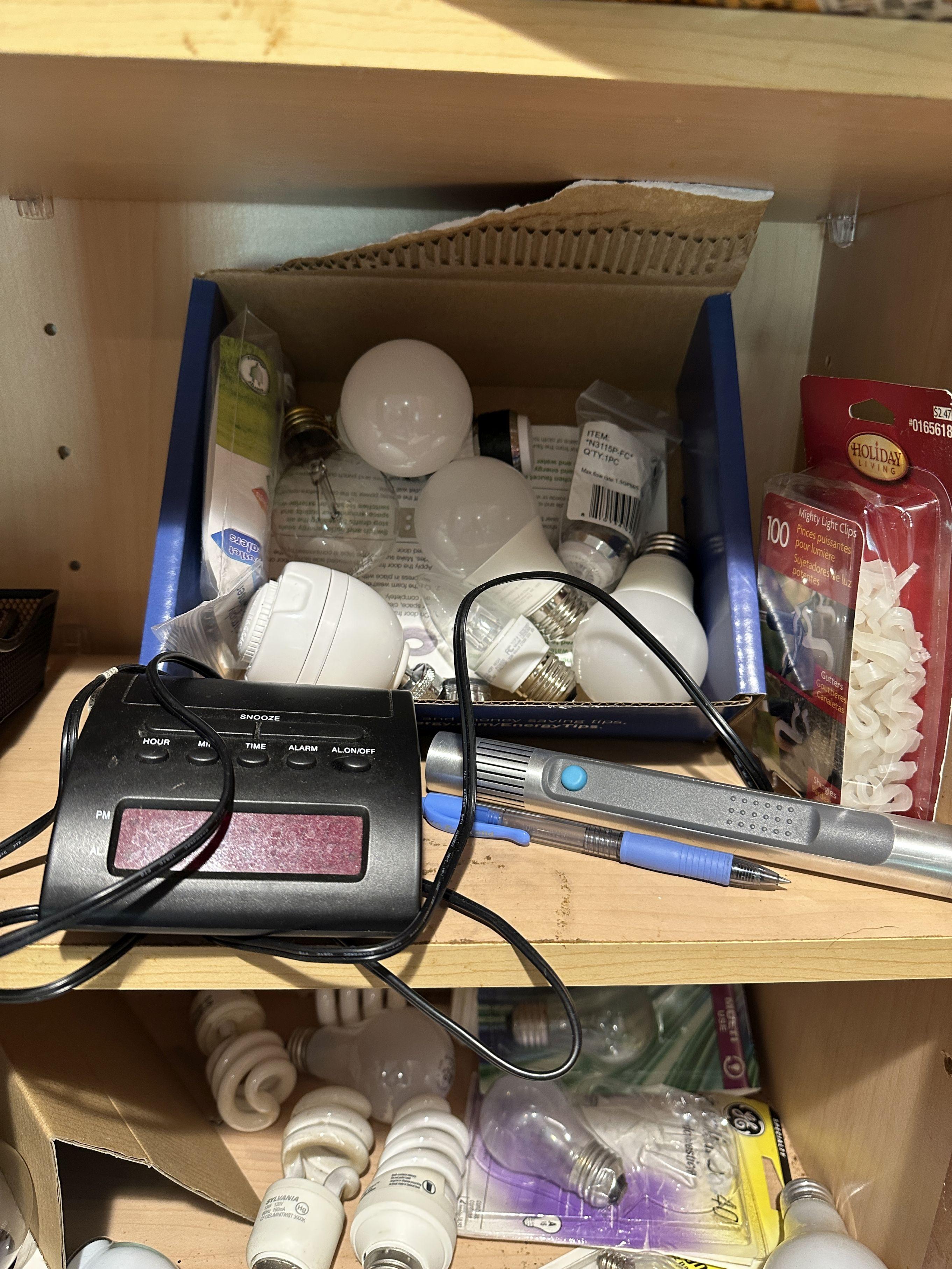Cabinet Full of Light Bulbs, Hammer, ETC