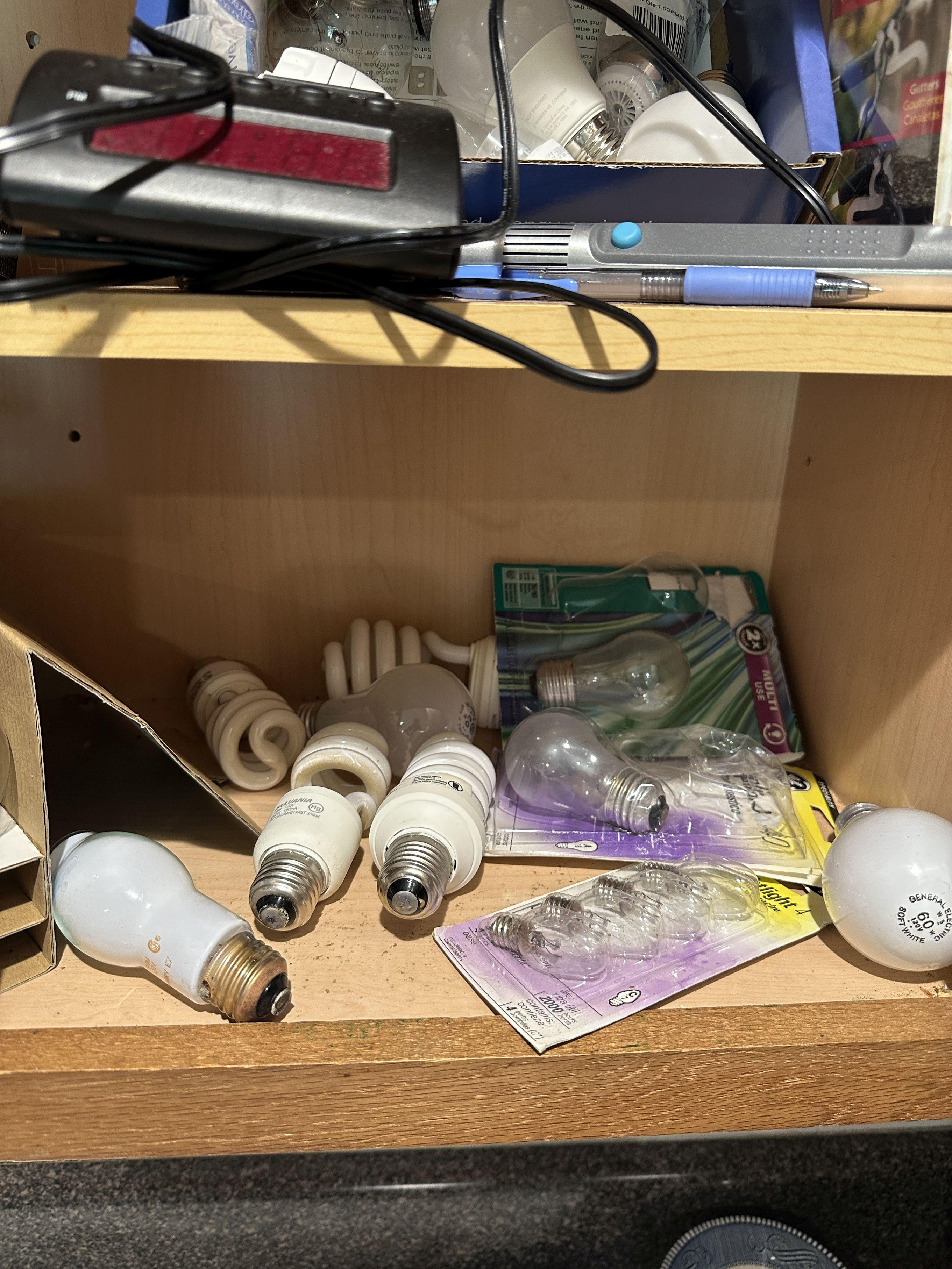 Cabinet Full of Light Bulbs, Hammer, ETC