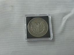 morgan dollar, 1878 P in hard case have not been porfessionally authenticated