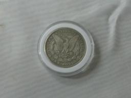 morgan dollar, 1897 P in hard case have not been porfessionally authenticated