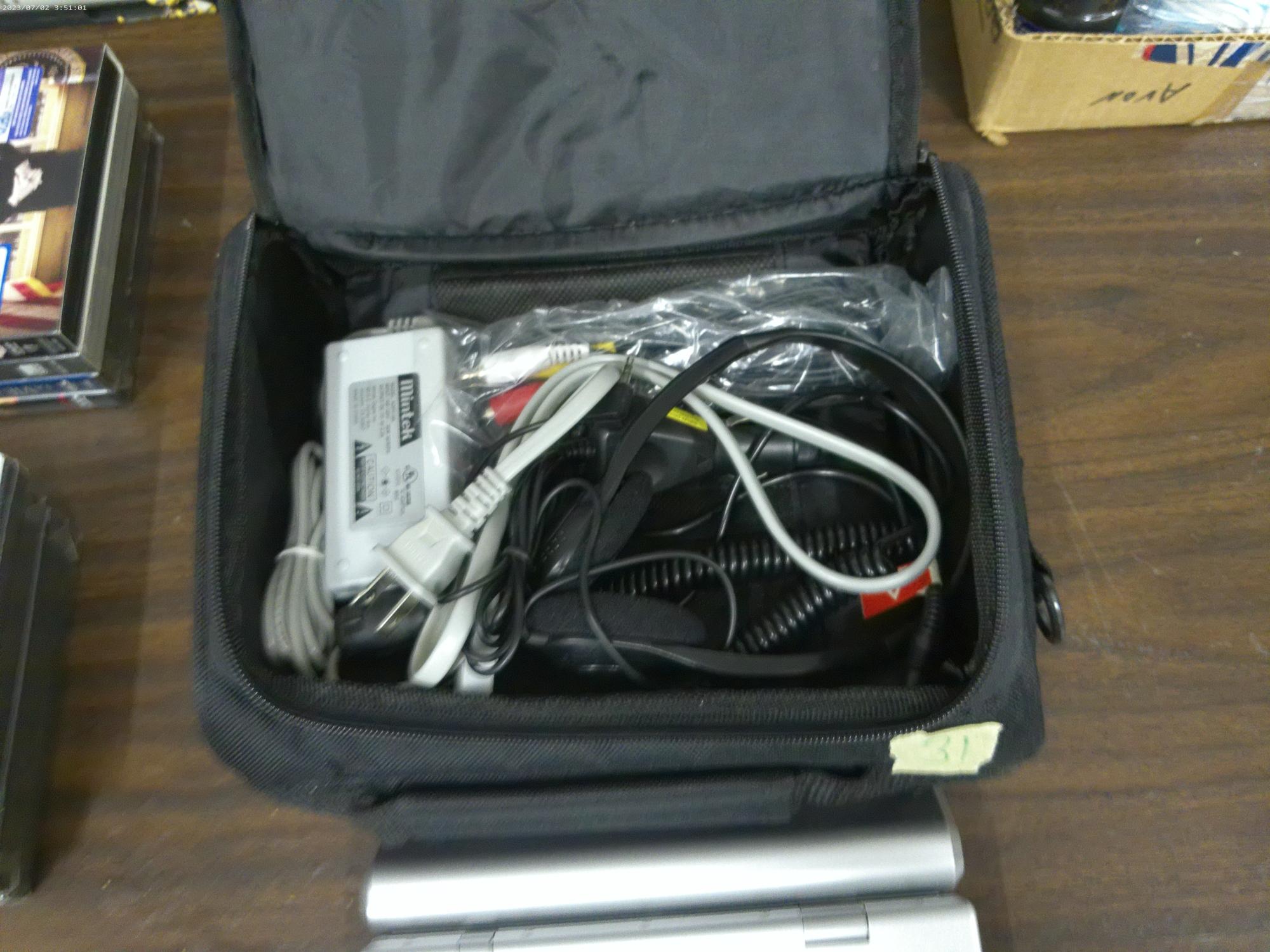 portable dvd player, very nice shape with carrying case and all plugs for house and car use also a s