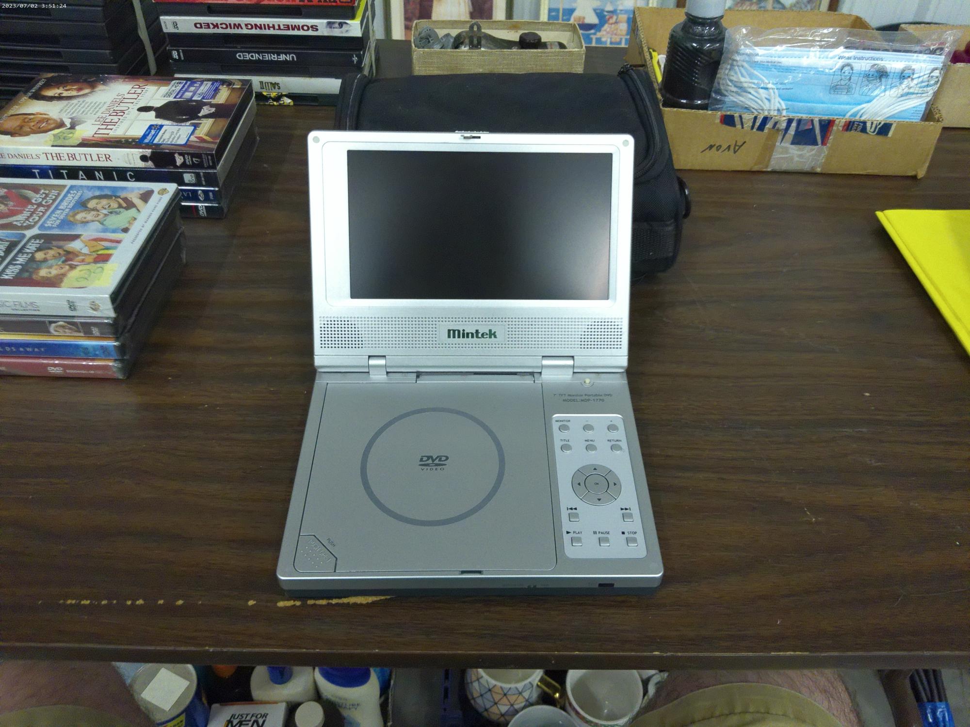 portable dvd player, very nice shape with carrying case and all plugs for house and car use also a s