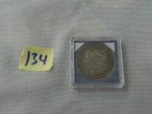 morgan dollar, 1878 P in hard case have not been porfessionally authenticated